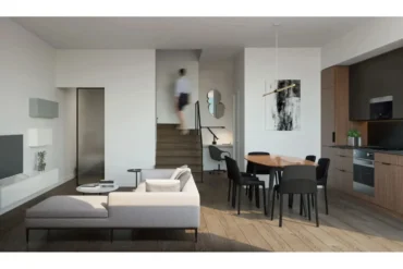 Open living and dining area in a suite at 28 Eastern by Alterra in Toronto