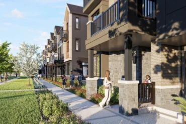 Tree-lined walkway beside townhomes at Clairmont by Mattamy Homes in Guelph