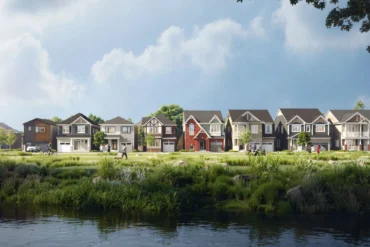 Row of homes beside a pond at Half Moon Bay by Mattamy Homes in Barrhaven Ottawa