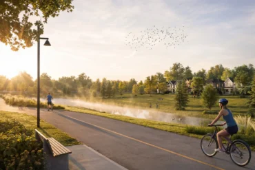 Cyclist on the pond pathway at Magnolia by Caivan in Stittsville, Ottawa