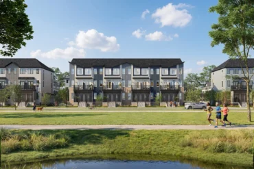 Townhomes beside a pond at Magnolia by Caivan in Stittsville, Ottawa