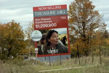 Treasure Hill roadside sign for Eversley Estates in King City advertising new release estate homes at $1,299,900 with bungalows available