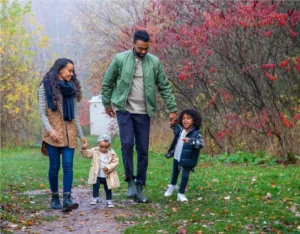 Family walking on a trail near Wildflowers by Mattamy Homes in Kitchener