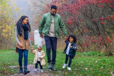 Family walking on a trail near Wildflowers by Mattamy Homes in Kitchener